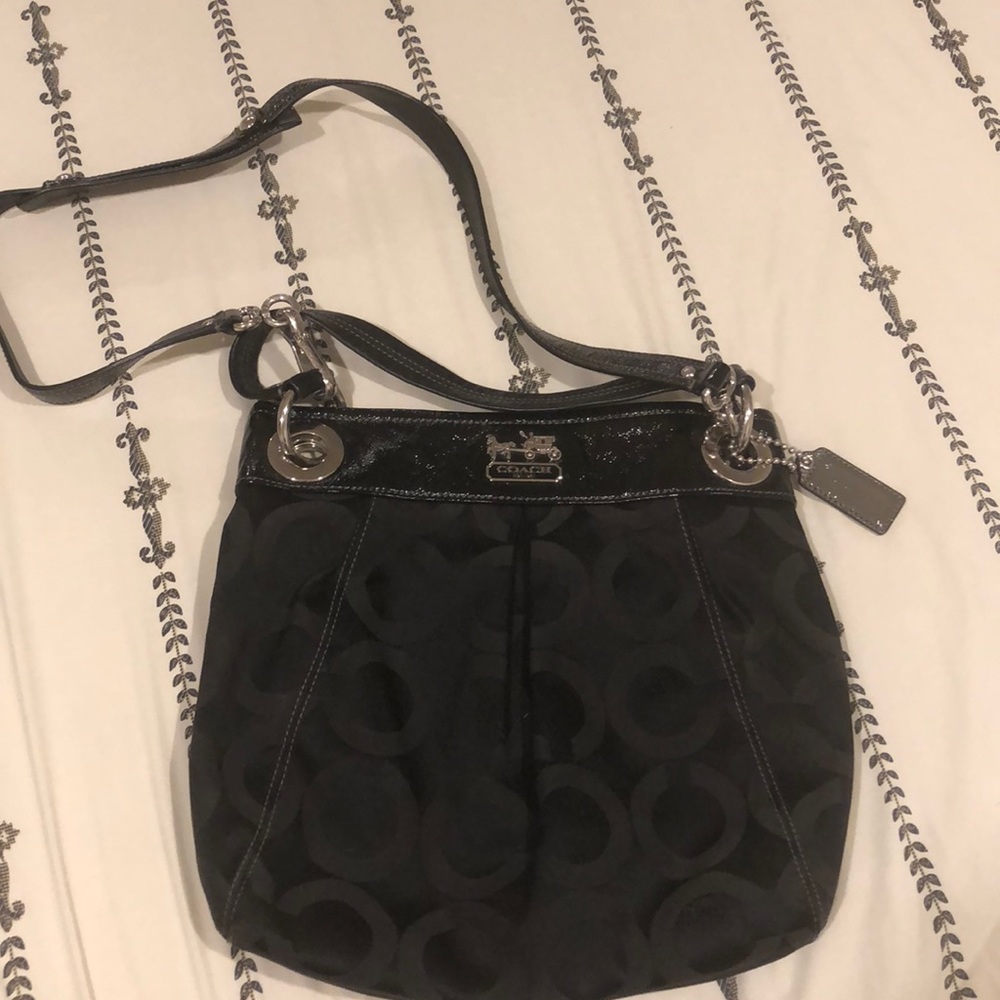 Black monogrammed Coach satchel